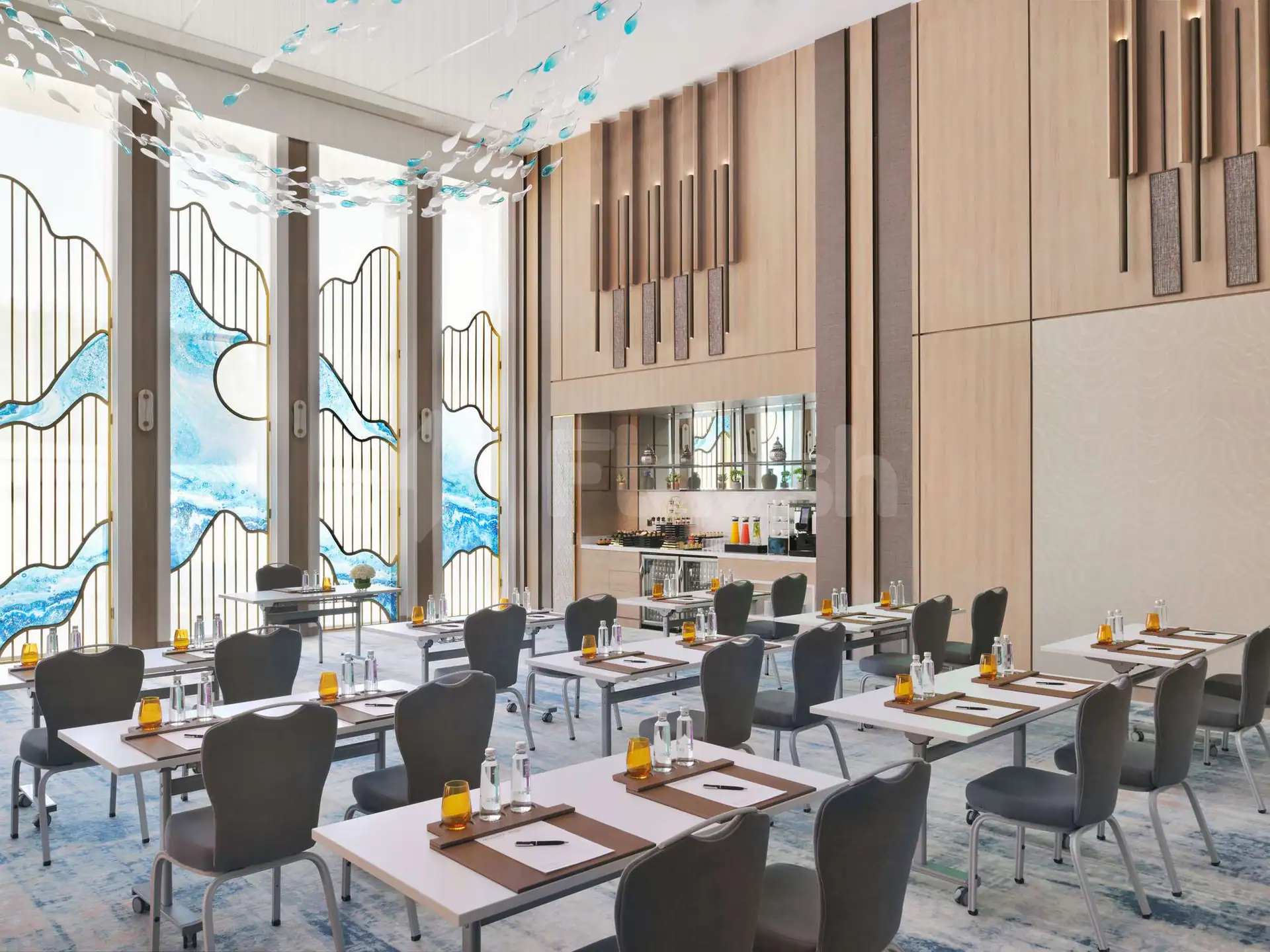 Meeting room at Rasoi By Vineet Jeddah featuring large wave-motif windows and hanging fish-shaped light fixtures