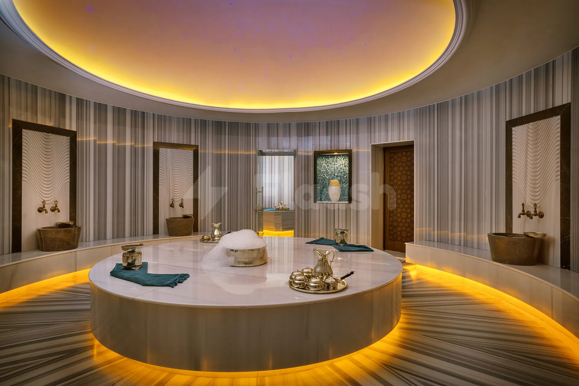 Circular marble hammam at Zoya Health & Well-Being Resort in Ajman with starry ceiling effect