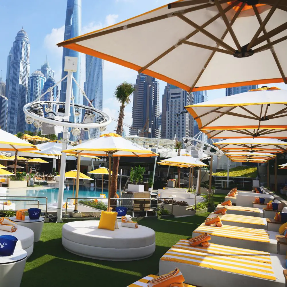 Rooftop terrace at O Beach Dubai in Dubai with green artificial turf and pool view