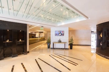 Entrance Hall / Reception Desk at Millennium Downtown Abu Dhabi in Abu Dhabi, shown within the event venue setting