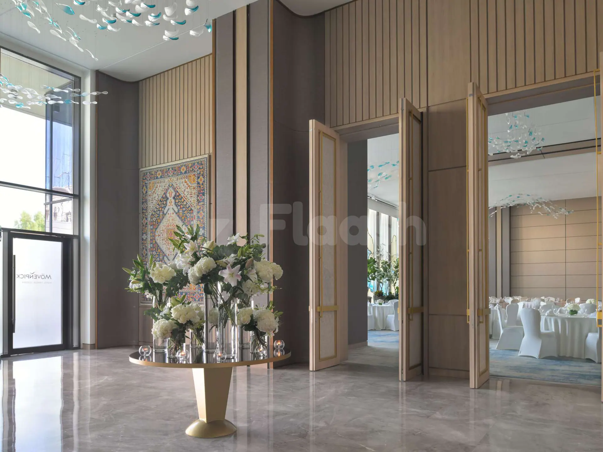Entrance hall at Rasoi By Vineet Jeddah in Jeddah with open double doors revealing banquet space