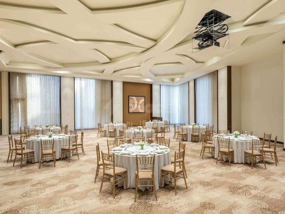 Banquet hall at Alwadi Hotel Doha MGallery By AccorHotels, Doha, with geometric ceiling design and patterned carpet flooring