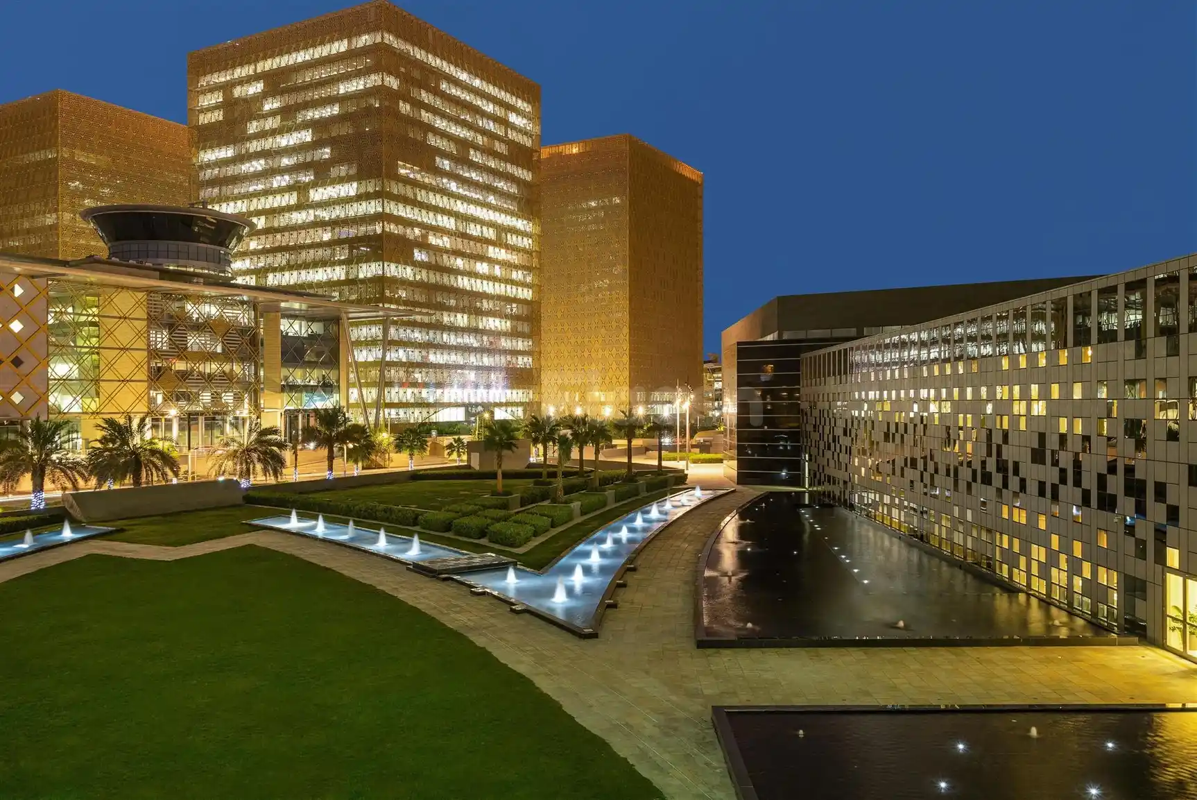 Lobby courtyard at Crowne Plaza Riyadh RDC Hotel & Convention, Riyadh, featuring illuminated fountains and geometric facade lighting
