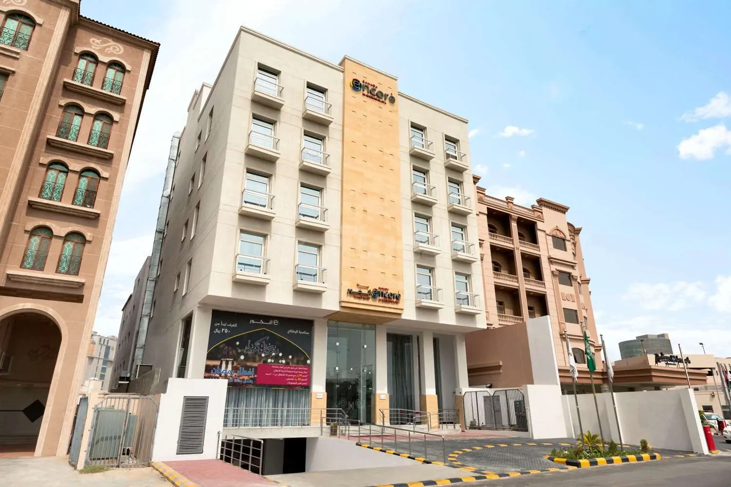 Modern hotel 5-story hotel facade at Ramada Encore by Wyndham Al Khobar Olaya, Al Khobar, featuring glass entrance