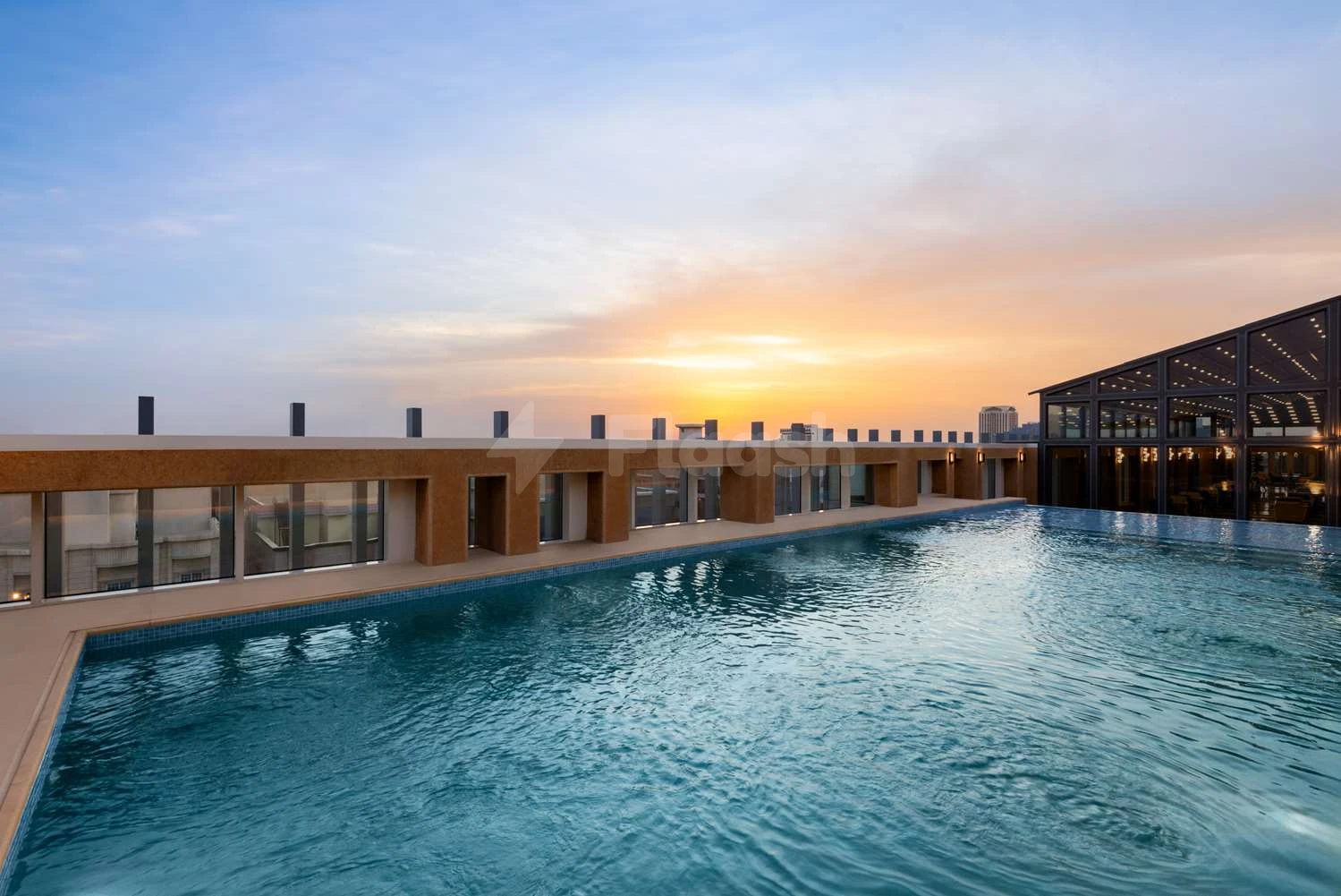 Rooftop pool at Radisson Blu Hotel Jeddah Al Hamra, Jeddah, with sunset glow
