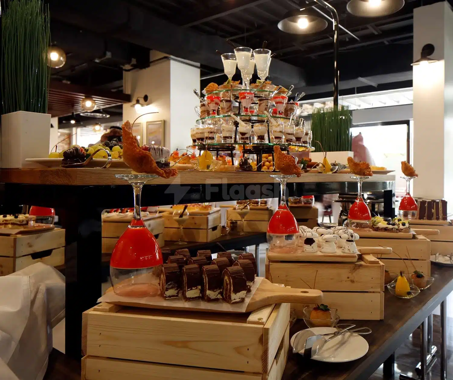 Buff! Breakfast buffet at Park Inn by Radisson, Najran, featuring tiered glass stands and wooden crate displays