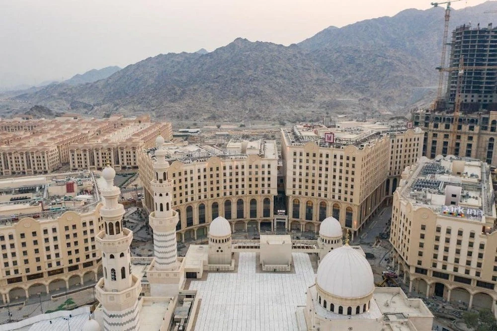 Rooftop terrace at Copthorne Makkah Al Naseem, Makkah, overlooking domed courtyards nestled among sandstone buildings