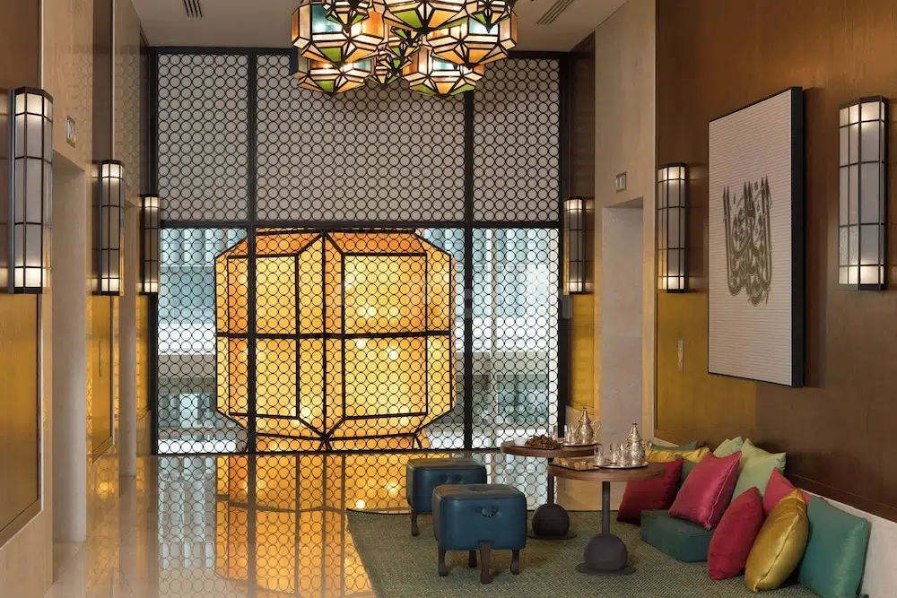 Lobby at Assila, a Luxury Collection Hotel, Jeddah, featuring geometric lanterns and patterned screens