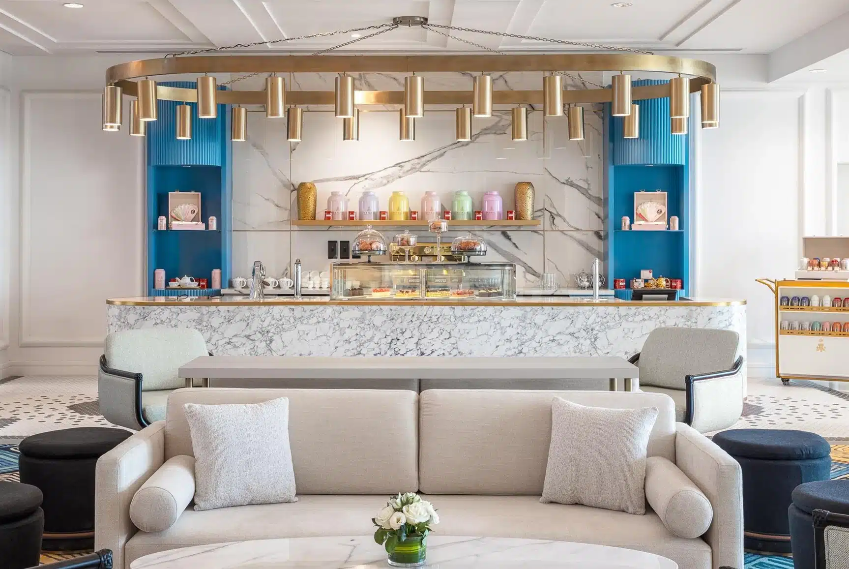 Lobby lounge at Sofitel Al Hamra Beach Resort, Ras Al-Khaimah, featuring marble bar and gold pendant lights