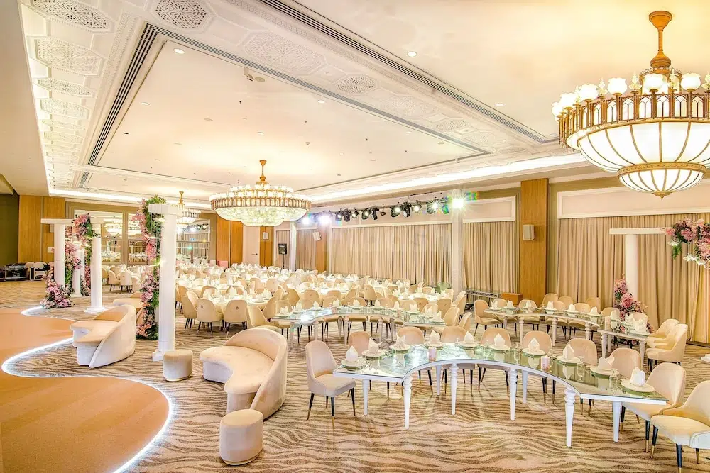 Banquet hall at Sheraton Abu Dhabi Hotel & Resort, Abu Dhabi, with ornate ceiling panels and grand chandeliers