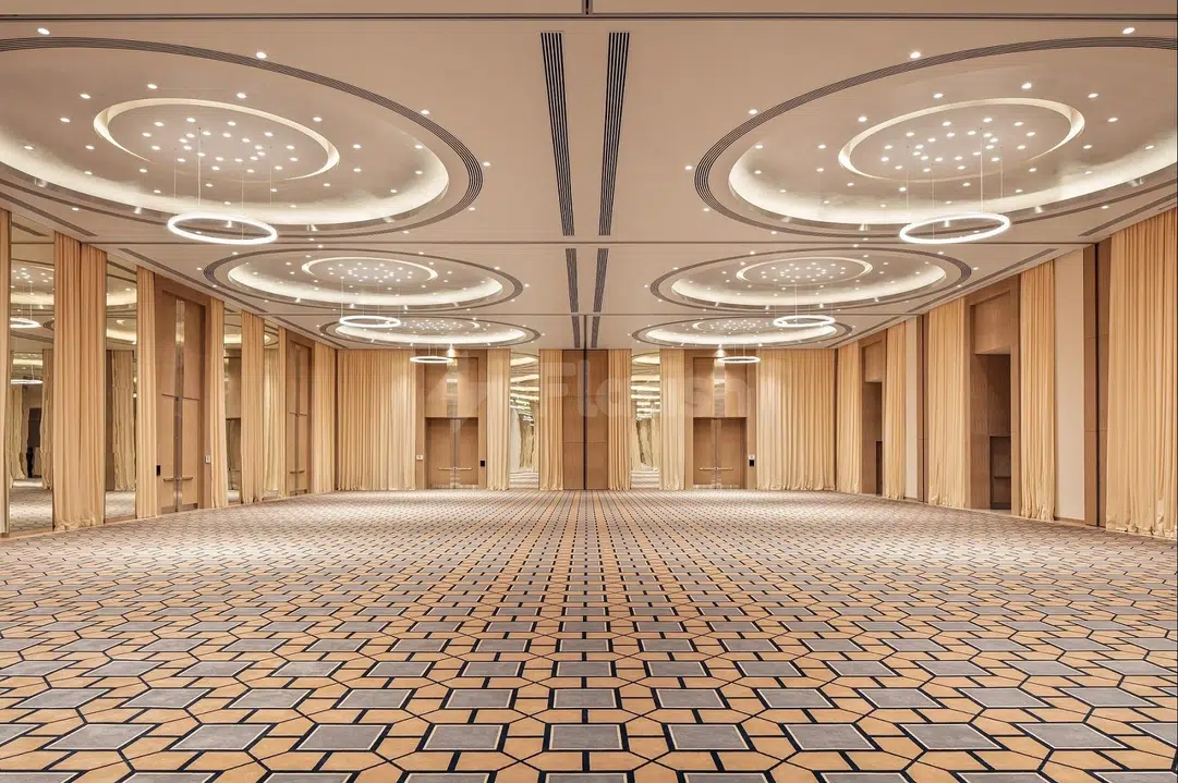 Ballroom at DoubleTree by Hilton Fujairah City, Fujairah, with geometric carpet and circular ceiling lights