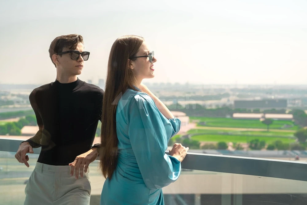 Rooftop terrace at The First Collection Dubai Business Bay, Dubai, with cityscape view and glass railing