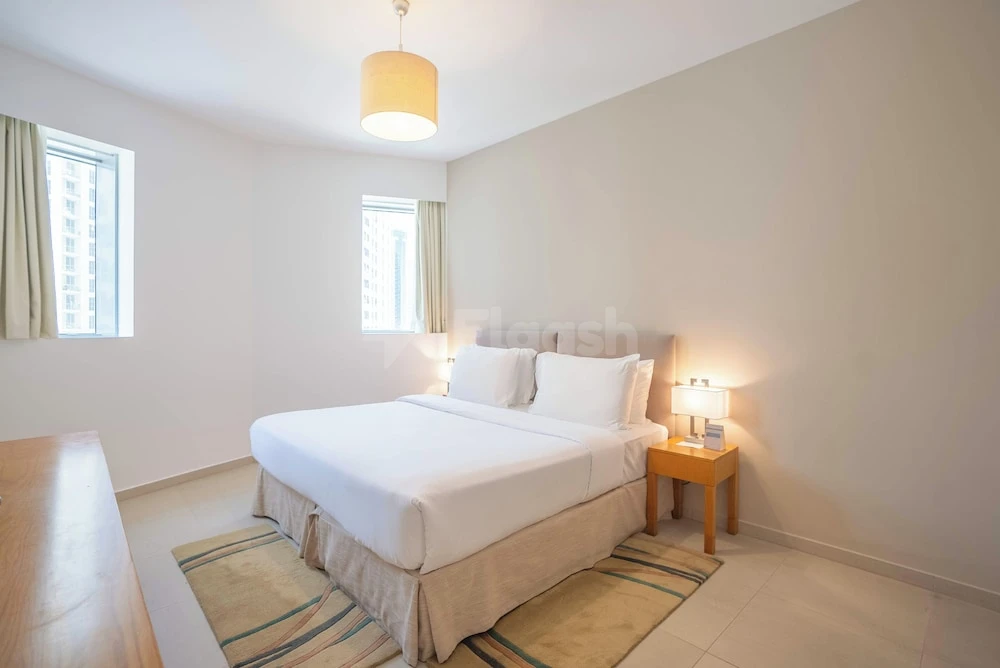 Bedroom at Grand Heights Dubai Hotel Apartments in Dubai, shown within the event venue setting